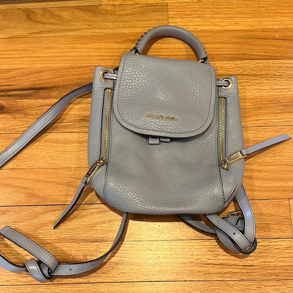 Michael Kors Handbags - Michael Kors Blue Backpack with Flap-Over Design